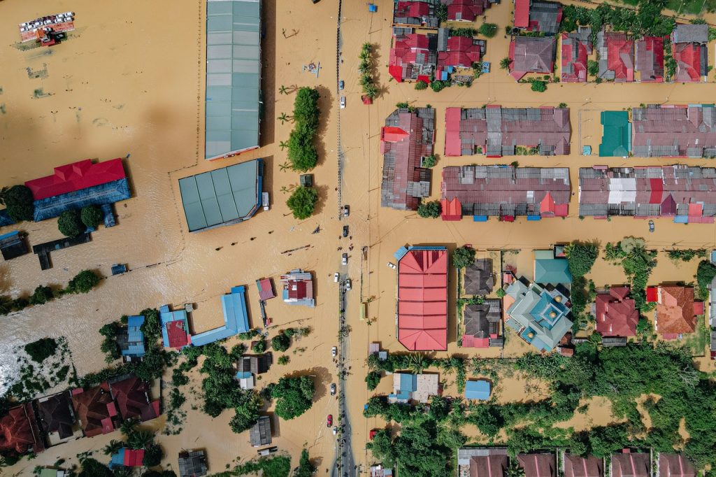 An aerial view of a town affected by flooding